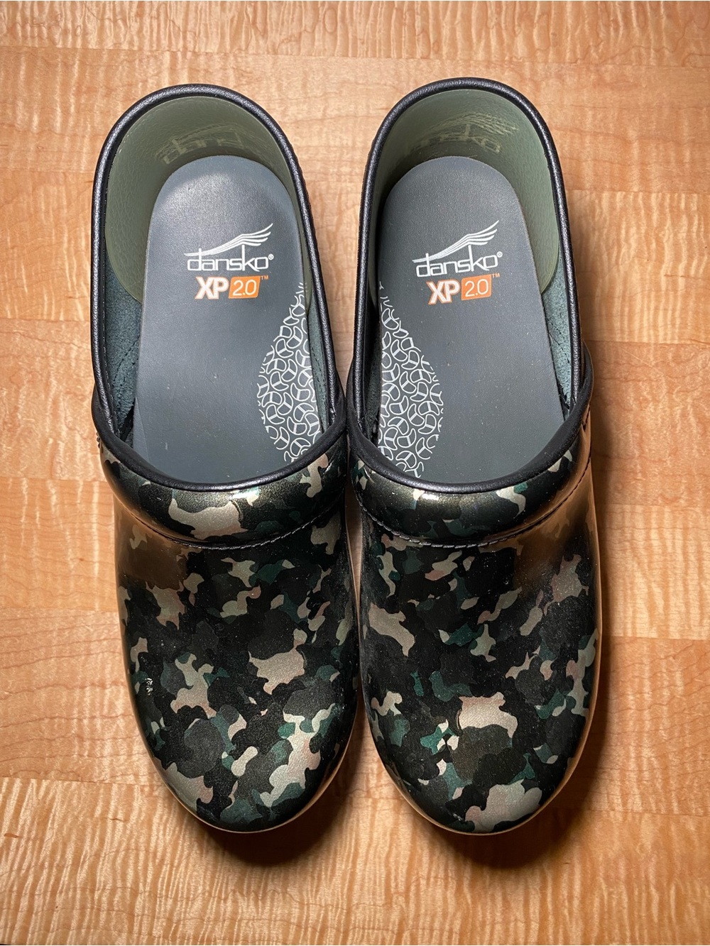 Dansko Clog Slip-Ons in Black and Green Camo